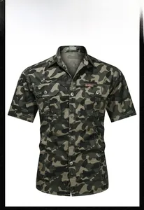 Detail of men's camouflage short sleeve shirt with classic collar and double chest pockets