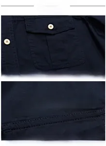 Detail view of navy blue cotton shirt with chest pocket and white OFF-ROAD printed text