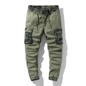 Men's loose cargo pants in military green with camouflage patchwork and drawstring cuffs