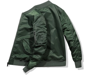 Detailed view of military green bomber jacket featuring ribbed cuffs and utility arm pocket