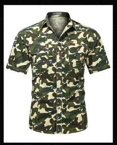 Detail of military camo short sleeve shirt showing metal buttons and outdoor chest pockets