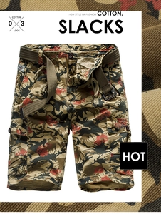 Detail of cotton camo cargo shorts with metal zipper, belt and woven fabric texture
