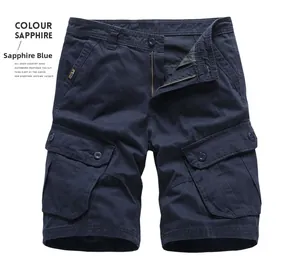 Macro shot of durable navy blue cotton twill fabric and utility side pockets on cargo shorts