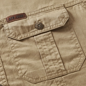 Men's casual khaki short sleeve shirt featuring cargo pocket with metal button detail