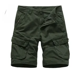 Detail of green cargo shorts featuring durable canvas fabric and large flap pockets