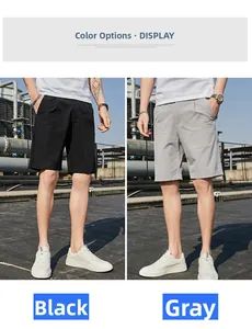 Détail du tissu respirant des shorts décontractés pour hommes en noir et gris chiné