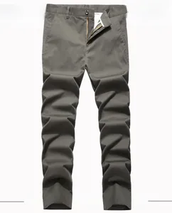 Detail of men's casual straight-leg trousers with zipper fly and side pockets