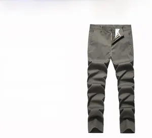 Detail of cargo pants with 3D cut and durable heavy cotton fabric in dark olive green