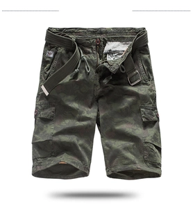Detail of cargo shorts in green camouflage pattern with cotton fabric and canvas belt