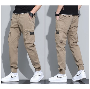 Detailed views of khaki cargo joggers featuring multi-pocket design and elastic drawstring waist