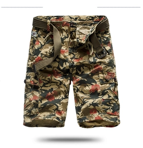 Detail of camouflage cargo shorts showing cotton fabric, side pockets, and woven belt
