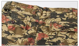 Detail of waist and flap pocket on cargo shorts with floral tiger camo pattern
