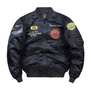 Detailed embroidery patches on black MA1 pilot jacket featuring military eagle and text