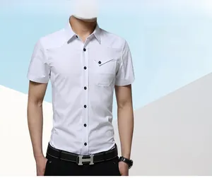 Detail view of white slim-fit short-sleeve shirt with contrast buttons and chest pocket