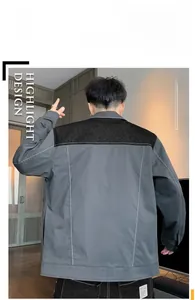 Detail of color-block jacket for men with white stitching and casual loose fit