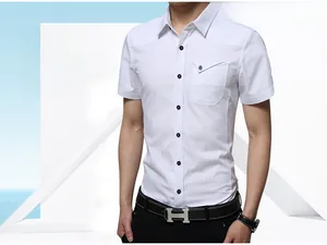 Detail of white short sleeve shirt with black contrast buttons and chest flap pocket
