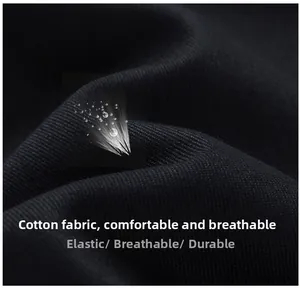 Macro shot of breathable black cotton fabric showing texture and elastic properties