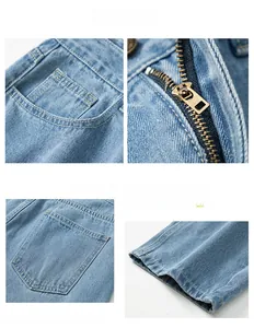 Detalles de vaqueros azul claro con costuras, cremallera de bronce y textura de tela denim