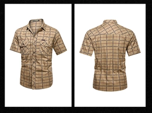 Detail of khaki plaid cotton shirt featuring two classic chest utility flap pockets