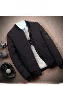 Detail view of black bomber down jacket with 90% white duck down filling and arm pocket