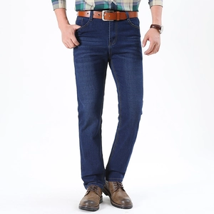 Classic straight-leg dark blue denim jeans for men featuring natural whiskering details