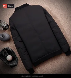 Flat lay of black down flight jacket with 90 percent white down filling on rustic background