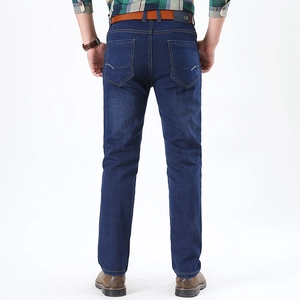 Men's classic dark blue straight leg denim jeans shown from a back view with belt