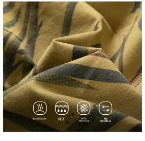 Detail of yellow leaf-printed fabric with breathable, quick-dry, and wrinkle-free features