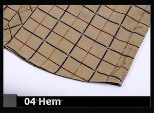 Detailed view of the hem on khaki plaid cotton casual work shirt for men