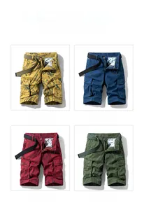 Detail of four-color cargo shorts in khaki, navy, red and green with tactical belts