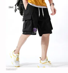 Detail of black cargo shorts with white drawstring and purple geometric letter print