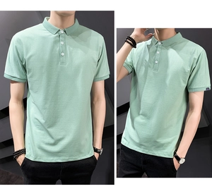 Close-up detail of light green Polo shirt featuring three white buttons and classic collar