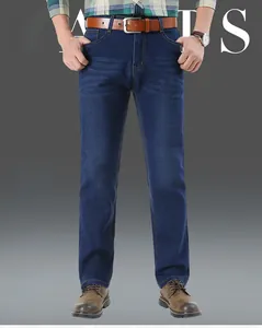 Close-up of dark blue men's straight-leg jeans with stretch fabric and waist detail