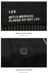 Close-up of black cargo shirt featuring chest pocket print and textured twill fabric details