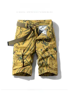 Detail of khaki cargo shorts with green leaf camouflage, multi-pockets and woven belt