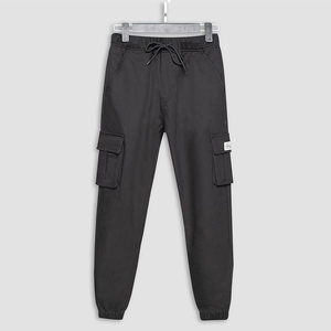 Men's black cargo joggers with drawstring elastic waist and side flap pockets