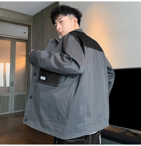 Rear view of vintage casual patchwork jacket with white contrast stitching and dropped shoulders