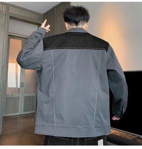 Back view of a casual patchwork jacket for men showing black and grey panel details