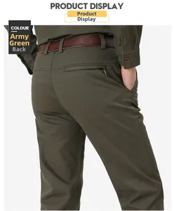 Detail view of army green men's casual pants with leather belt and zip back pocket