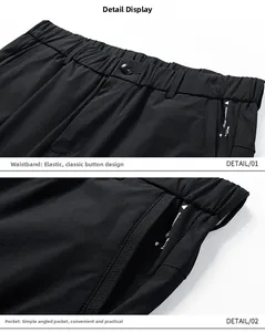 Détail du short décontracté noir pour homme avec taille élastique et fermeture boutonnée