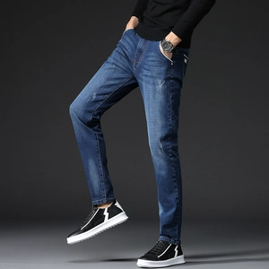 Men's slim fit stretch denim jeans in dark blue with distressed wash and tapered leg