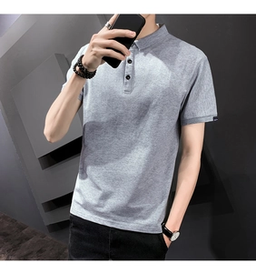 Detail of grey slim-fit Polo shirt featuring premium cotton texture and sleeve tag detail