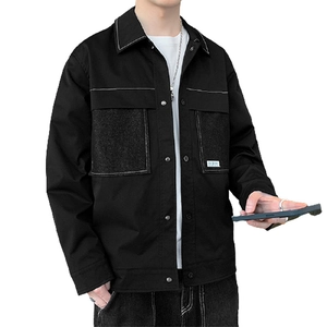 Men's black cargo jacket with white contrast stitching and large pockets in minimalist style