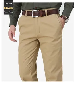 Close-up of khaki casual men's trousers with a brown leather belt and square buckle
