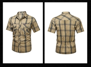 Detail of khaki plaid short sleeve men shirt with dual chest flap utility pockets