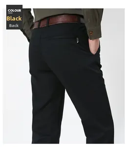 Macro shot of back pocket with premium zipper on men's black business casual trousers