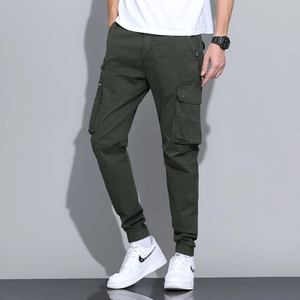 Army green men's cargo pants in cotton twill featuring multi-pocket joggers design