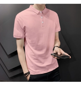 Close-up of pink slim fit cotton polo shirt featuring white buttons and ribbed cuffs