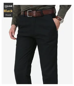 Detail of men's slim fit black casual trousers with a leather belt and metal buckle