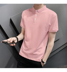 Detail of light pink slim fit polo shirt with classic three-button placket and collar